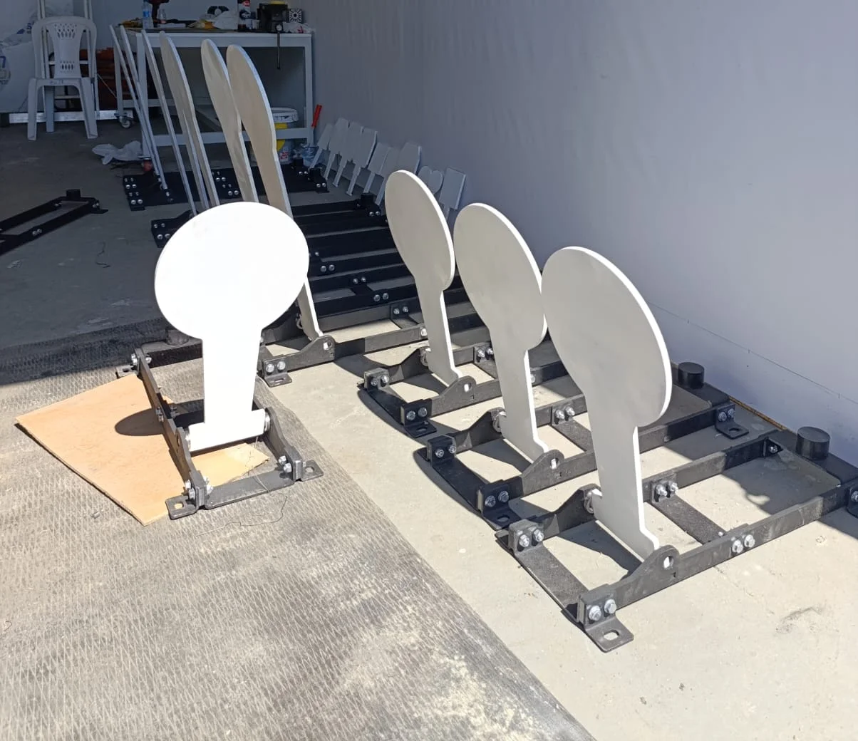 Ballistic steel plate targets on knock-down bases at the AYZET facility