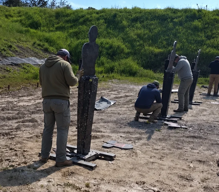 AYZET technical team preparing targets on a range